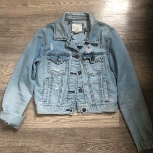 Distressed denim jacket